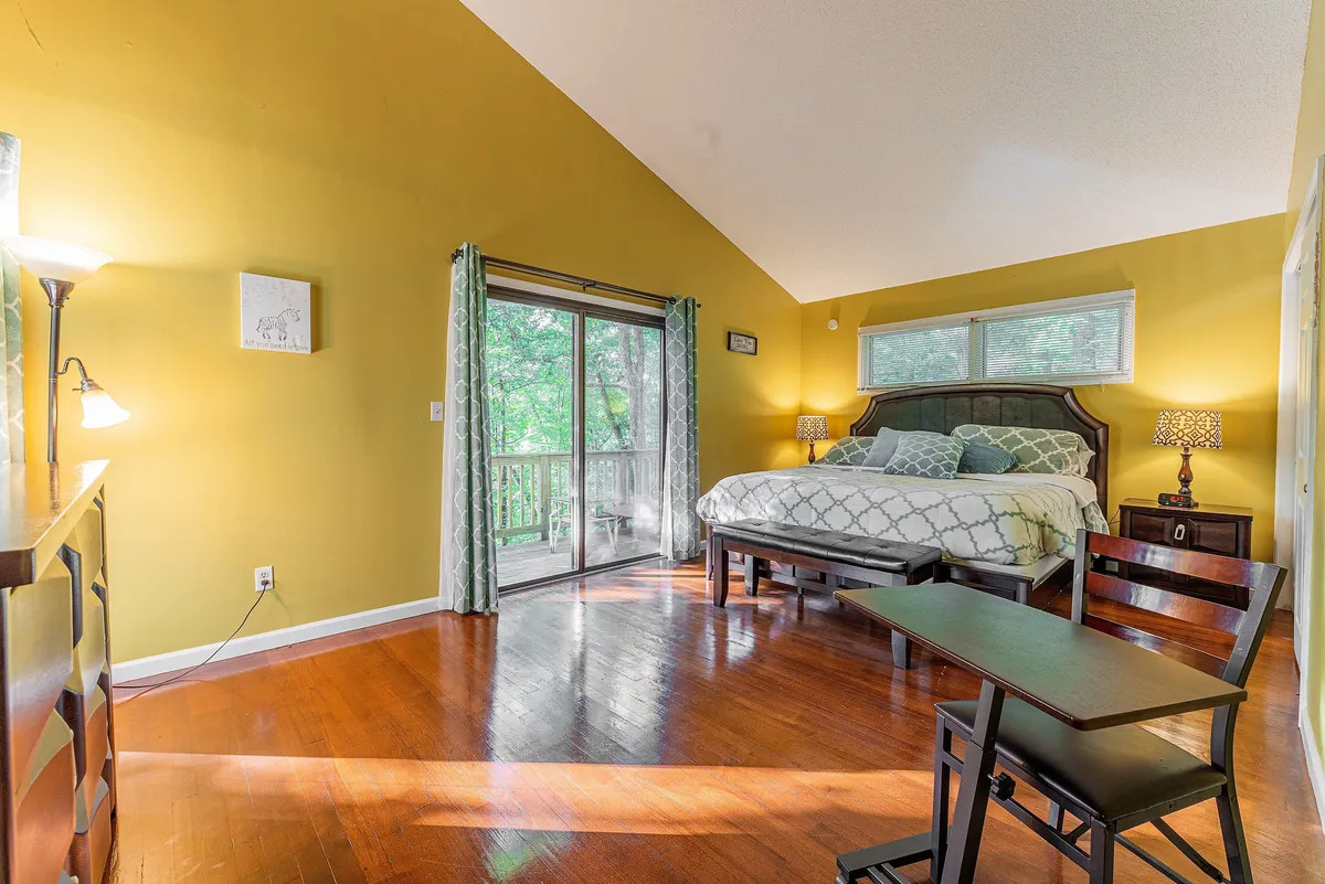 Primary bedroom king with crib