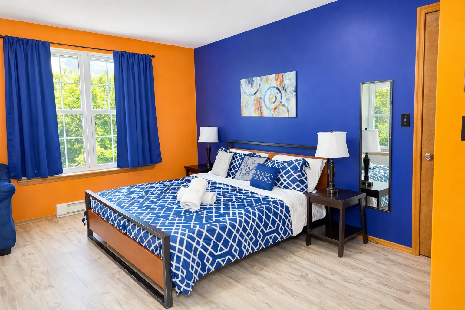 Master bedroom with crib and king bed